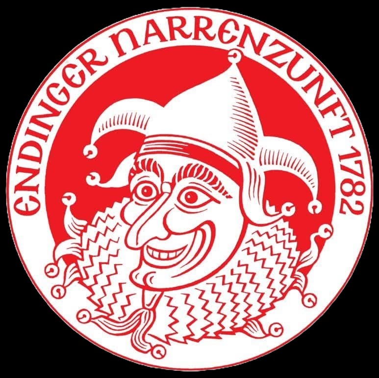 Rotes Emblem mit einem lachenden Narren und der Aufschrift "Endinger Narrenzunft 1782".